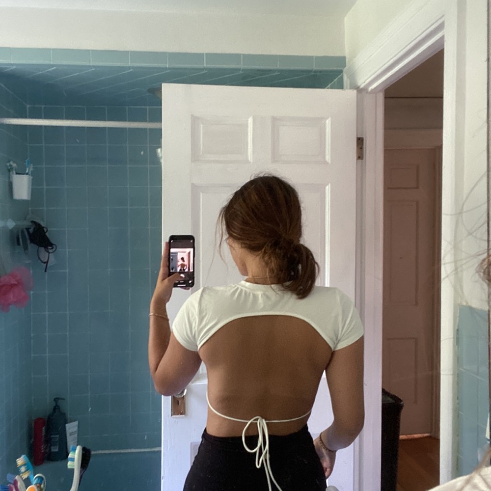 Open back white top